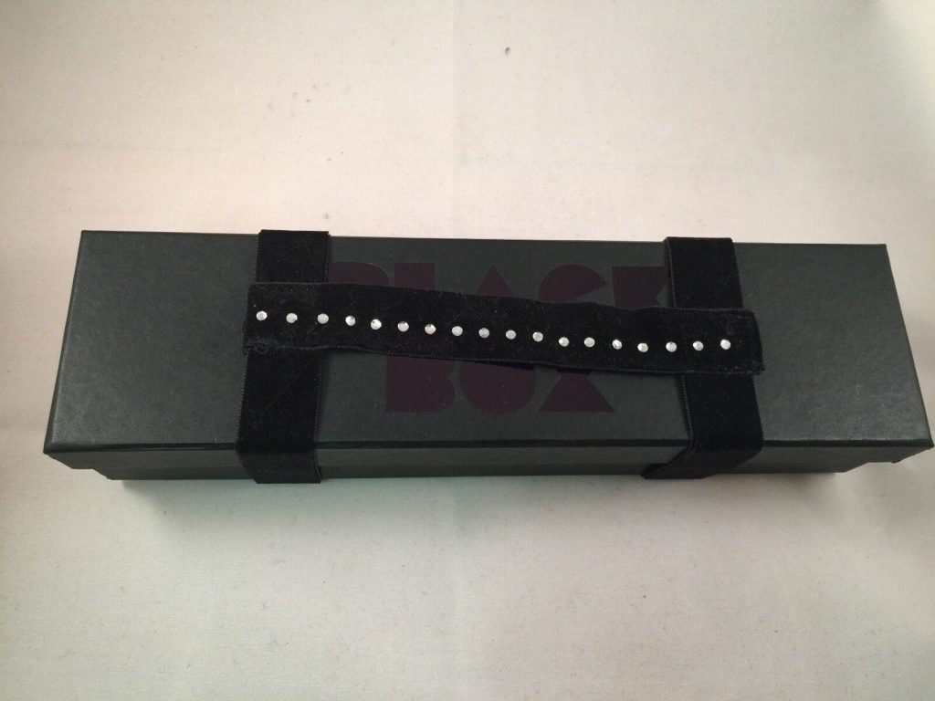 EROTIC BLACK BOX WITH G-STRING,EYE MASK,VELVET CUFFS AND 2 OSTRICH FEATHERS