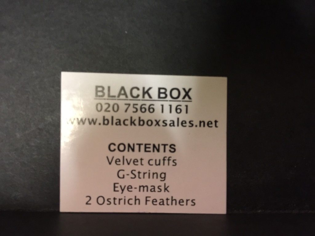 EROTIC BLACK BOX WITH G-STRING,EYE MASK,VELVET CUFFS AND 2 OSTRICH FEATHERS